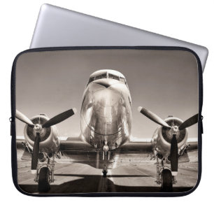 vintage aeroplane on a runway laptop sleeve
