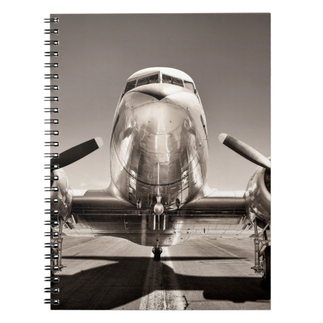 vintage aeroplane on a runway notebook (Front)