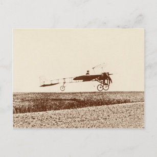 Vintage aeroplane taking off postcard