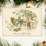 Vintage Beatrix Potter Christmas Greetings Holiday Card<br><div class="desc">Vintage Beatrix Potter illustration featuring her classic rabbits receiving holiday greetings on a snowy day with a sled pulled along for the trip.  Delight your loved ones and friends with a bit of Christmas fairy tale nostalgia this year!</div>