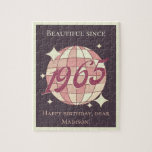 Vintage born in 1965 59th 60th birthday jigsaw puzzle<br><div class="desc">Retro Vintage-style Puzzle as a 60th birthday gift! Get ready to groove under the disco ball,  with a splash of light pink tones and a groovy vintage "1964" script on a dark purple toned background.</div>