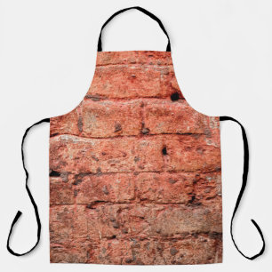 Vintage brick wall with some stones in it, brick apron