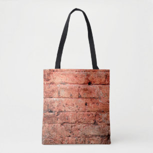 Vintage brick wall with some stones in it, brick tote bag