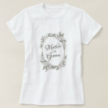 Vintage Cherish Rose Gold Oval Mother of the Groom T-Shirt<br><div class="desc">Vintage Cherish White Floral & Rose Gold Painted Roses and Flowers. A Vintage Classic and Elegant Look, and Plenty of Grey, Ivory White, Rose Gold, Dusty Pink, Pine Green, and Grey leaves and foliage. With Hand Painted Floral elements, Vintage Classic Script Fonts and Rose Gold Elegant Floral Oval Frame -...</div>