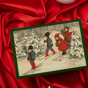 Vintage Children Skiing Through a Snowy Forest Holiday Card