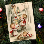 Vintage Christmas Baby Angels Decorate Tree Holiday Card<br><div class="desc">Vintage Christmas Baby Angels Decorate Tree Holiday Card.</div>