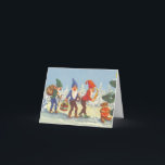 Vintage Christmas, Elves in the Snow Forest Winter Holiday Card<br><div class="desc">Vintage illustration Victorian Merry Christmas holiday image featuring elves with beards and pointed hats walking in the snow. They look like tomte, nisse or tomtenisse (Sweden) nisse (Norway and Denmark) or tonttu (Finland), a mythological creature from Scandinavian Norse folklore. The blue elf is carrying a wreath, the green elf is...</div>