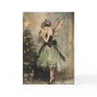Vintage Christmas Fairy in Green Decorating Tree