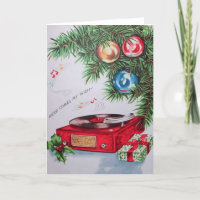 Vintage Christmas Record Playing Under Tree