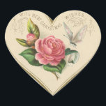 Vintage Christmas Rose and Butterfly Heart Sticker<br><div class="desc">This vintage sticker features a heart with a Christmas rose,  butterfly and greetings. This lovely sticker can be used on cards,  envelopes,  gift baskets,  presents etc.

Enjoy your new Vintage Christmas Rose and Butterfly Heart Sticker!</div>