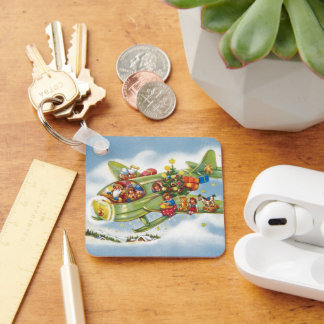 Vintage Christmas, Santa Claus Flying an Aeroplane Key Ring