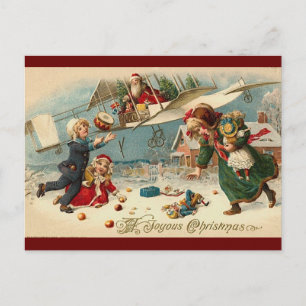 Vintage Christmas santa in aeroplane children toys Postcard