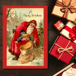 Vintage Christmas Santa Putting Child In Bag Holiday Card<br><div class="desc">Vintage Christmas Santa Putting Child In Bag Holiday Card.</div>