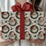 Vintage Christmas Santa with Holly Wreaths Pattern Wrapping Paper<br><div class="desc">Celebrate the holiday season with this Vintage Santa Christmas design featuring festive holly and berry wreaths and cheerful holiday colours. With its playful charm and joyful winter details, it’s perfect for adding a fun seasonal touch to your presents. Printed on premium gift wrap, making every gift feel extra special under...</div>