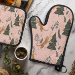 "Vintage Christmas Tiger with Christmas Tree Pink  Oven Mitt & Pot Holder Set<br><div class="desc">Bring playful charm and vintage flair to your kitchen with the Vintage Christmas Tiger with Christmas Tree Pink Oven Mitt & Pot Holder Set. This festive set features a cute tiger surrounded by Christmas trees, set against a cheerful pink backdrop. Perfect for adding a touch of whimsy to your holiday...</div>