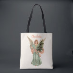 Vintage Christmas, Victorian Angel with Tree Tote Bag<br><div class="desc">Easy to customise tote bag,  just add your name!
Vintage illustration Christmas religious holiday image featuring an angel with wings and wearing a crown or tiara holding a lit candle and a fir tree; antique Victorian die cut. Let this angelic image help you celebrate the holidays this season.</div>
