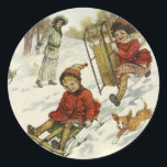 Vintage Christmas, Victorian Children Sledding Dog Classic Round Sticker<br><div class="desc">Vintage illustration Merry Christmas holiday image featuring happy girls and boys playing and sledding down a snow covered hill on Christmas Day. The brother and sister are having fun with their new toboggan while their pet terrier puppy dog is having fun too! Season's Greetings!</div>