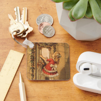 Vintage Christmas Victorian Girl Hanging a Garland Key Ring
