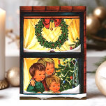 Vintage Christmas Window With Kids Holiday Card<br><div class="desc">Vintage Christmas Window With Kids Holiday Card. This design features three kids staring out of a snow covered Christmas window with a wreath. What a beautiful retro holiday scene. Personalize this custom design with your own inside greeting.</div>