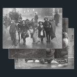 Vintage Christmas Wrapping Paper 1910s & 1920s<br><div class="desc">3 x original vintage festive Winter theme photograph sheets of Christmas wrapping paper - 1910s & 1920s, EARLY 20th CENTURY. TOP [Image 1]: Children Carrying Holly and Mistletoe (1915). MIDDLE [Image 2]: Father Christmas delivering presents to the Children's Aid and Adoption Society at Leytonstone, London (20th November 1931). BOTTOM [Image...</div>