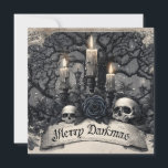 Vintage Engraving of a Gothic Christmas Scene Holiday Card<br><div class="desc">A highly stylised and detailed vintage engraving style image creating a gothic or macabre christmas card. The central focus is a banner displaying the text "Merry Darkmas" in an old English font. Above the banner are two human skulls flanking a dark blue or black rose, set amidst creepy twisted trees...</div>