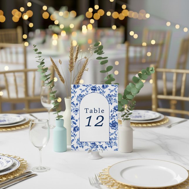 Vintage floral delftware table seating chart invitation (Blue and white delftware wedding table number sign.)