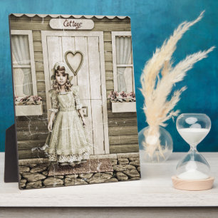 Vintage Girl standing near a Retro Cottage Plaque