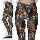 Vintage Gothic Lovers Floral Romantic Skeleton Leggings<br><div class="desc">Vintage Gothic Lovers Floral Leggings | Romantic Skeleton Kiss Design. Embrace the allure of darkness with the Vintage Gothic Lovers Floral Leggings. The romantic oil painting effect features kissing skeletons amidst a floral backdrop, adding a unique flair to your style. Perfect for those who appreciate gothic fashion, these leggings are...</div>