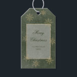 Vintage Green & Gold Glitter Snowflakes Gift Tags<br><div class="desc">Against a backdrop of rich, earthy dark green reminiscent of pine trees, this gift tag sets the stage for a truly magical look. The rich green is beautifully distressed with delicate white etchings, like ethereal constellations, while golden glittering snowflakes sprinkle across the canvas, adding a touch of whimsy and sparkle....</div>