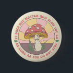 Vintage Groovy Motivational Mushroom 6 Cm Round Badge<br><div class="desc">A pink and yellow mushroom stands front and centre with a few blades of grass growing out of the mauve ground. There is a wavy pink and yellow sunbeam behind it. Overall the drawing has a vintage and groovy vibe. Going in a circle around the mushroom is this quote: "It...</div>