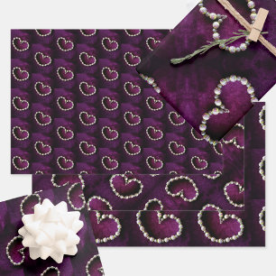 Vintage Heart Shaped Bead Necklace on Purple Wrapping Paper Sheet