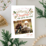 Vintage Holly Tilted Snapshot Photo Christmas Holiday Card<br><div class="desc">This festive and chic holiday photo card features our original hand-drawn winter foliage with sweet styled typography in vibrant colours and 2 tilted photos. The back comes with a matching pattern</div>