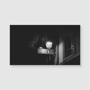 Vintage hotel sign, street light and many light