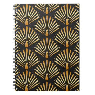 vintage illustration of golden peacock in black ba notebook
