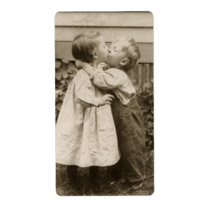 Vintage Love Photo of Children Kissing in a Garden