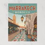 Vintage Marrakesh Morocco Souk Postcard<br><div class="desc">This postcard features a vibrant, vintage-style illustration of a bustling souk or market street in Marrakesh, Morocco. It depicts a lively scene with intricate tile patterns on the ground, lanterns, market stalls with colourful goods, and traditional architecture including a distant tower. The text "MARRAKECH MOROCCO" is written vertically on the...</div>
