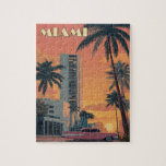Vintage Miami Florida Travel Jigsaw Puzzle<br><div class="desc">Step into the golden age of Miami with this vibrant vintage-style poster! Featuring iconic Art Deco skyscrapers, palm trees, and a sleek pink classic car cruising along a sunlit street, this design captures the essence of mid-century Miami glamour. Perfect for travelers, retro enthusiasts, or anyone who loves Florida’s coastal charm,...</div>