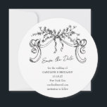 Vintage Minimalist Romantic Black White Wedding  Save The Date<br><div class="desc">Announce your big day in timeless elegance with this vintage-inspired round "Save the Date" card featuring hand-drawn botanical illustrations and graceful calligraphy. The design evokes an old-world charm with its delicate floral swag and ornamental ribbons, perfect for setting the tone for a romantic and sophisticated wedding. Ideal for formal weddings...</div>
