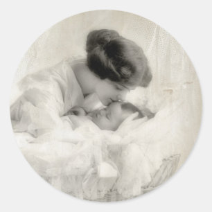 Vintage Mother Kissing Baby in Bassinet Classic Round Sticker