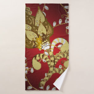 Vintage ornamental pattern on a red,  yellow and b bath towel
