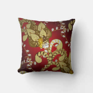 Vintage ornamental pattern on a red,  yellow and b cushion