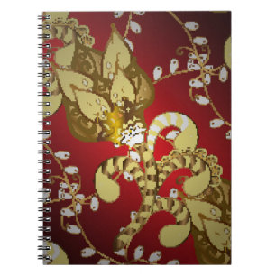 Vintage ornamental pattern on a red, yellow and b notebook