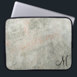 Vintage Parisian Advertisement with Monogram Laptop Sleeve<br><div class="desc">Customise with your own initial or remove the text.  A collage of vintage paris advertisement parchments. These ads are written in fancy elegant fonts and appear faded and worn. The texture looks old and weathered in greyish,  green,  and pale orangish coral tones. A chic and trendy style.</div>