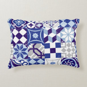 Vintage patchwork background with traditional blue decorative cushion