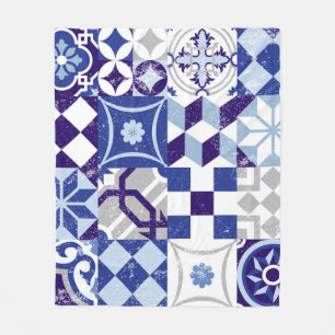 Vintage patchwork background with traditional blue fleece blanket