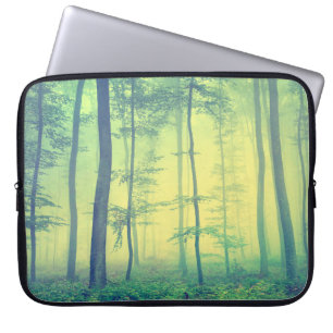 Vintage photo of foggy spring forest. laptop sleeve