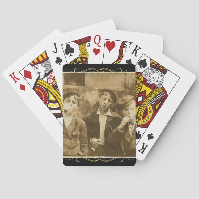 Vintage photograph of newsies smoking cigars playing cards (Back)