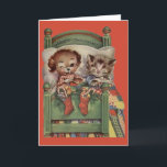 Vintage Puppy and Kitten Christmas Greeting Card<br><div class="desc">Retro / Vintage Christmas greeting card.  Adorable puppy and kitten snuggled in bed on Christmas Eve!  Merry Christmas.  Perfect for dog lovers and cat lovers!</div>