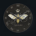 Vintage Queen Bee Royal Crown Honeycomb Black Round Clock<br><div class="desc">This vintage themed wall clock features a Queen Bee design of a honeybee with a royal crown on a black background and roman numerals. Makes a unique girly gift for any occasion. Designed by artist ©Tim Coffey.</div>