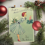 Vintage Retro 1950s Christmas Lady Custom Holiday Card<br><div class="desc">This mid-century vintage Christmas card features a lady dressed in a green and white striped dress, holding a bouquet of Christmas greenery, and blowing out a red and white striped Christmas candle. Personalise by adding your family name at the bottom of the card, customising the message inside the card and/or...</div>